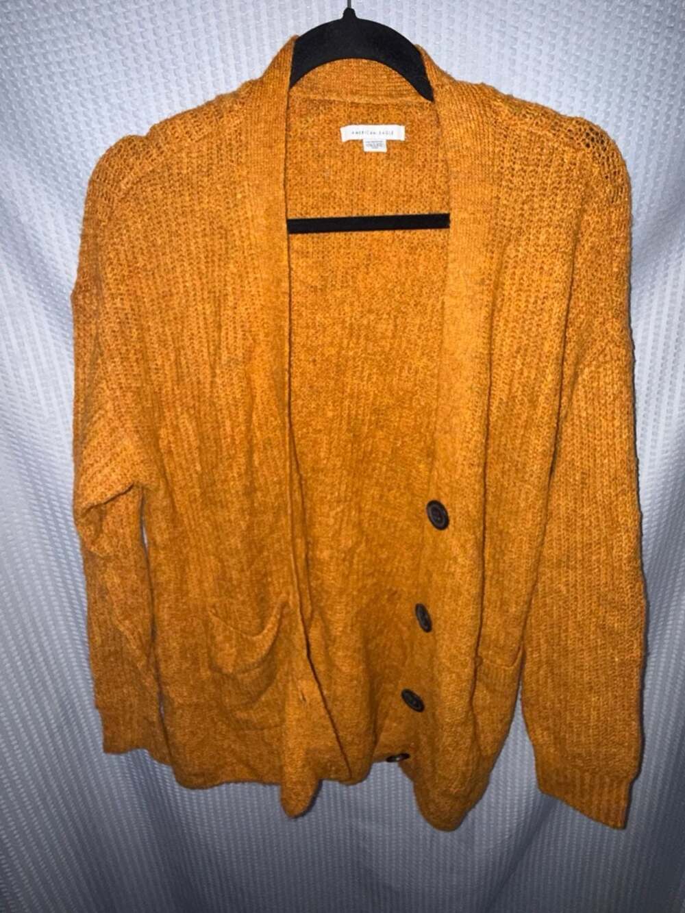 American Eagle Button-Front Textured Oversized Knit Cardigan in Mustard Yellow